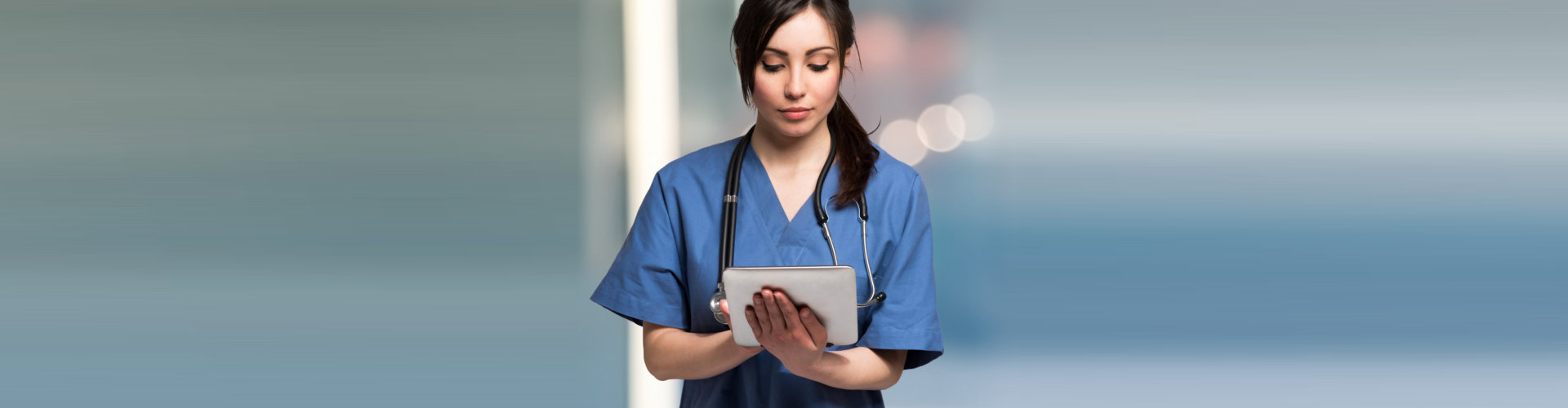 a nurse on a tablet